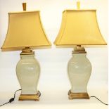 Pair of Chinese celadon crackle glazed style baluster shaped table lamps, on stepped rectangular