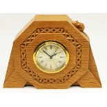 Robert Mouseman Thompson of Kilburn - an octagonal oak mantel clock, circular Roman dial with