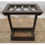 Edwardian oak stick stand, with patinated brass eight stick divider and galvanised lift out tray,