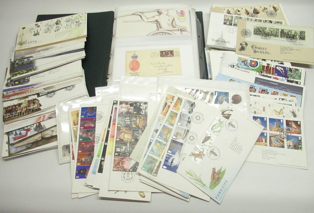 Mixed collection of first day stamp covers inc. a folder of first day stamp covers