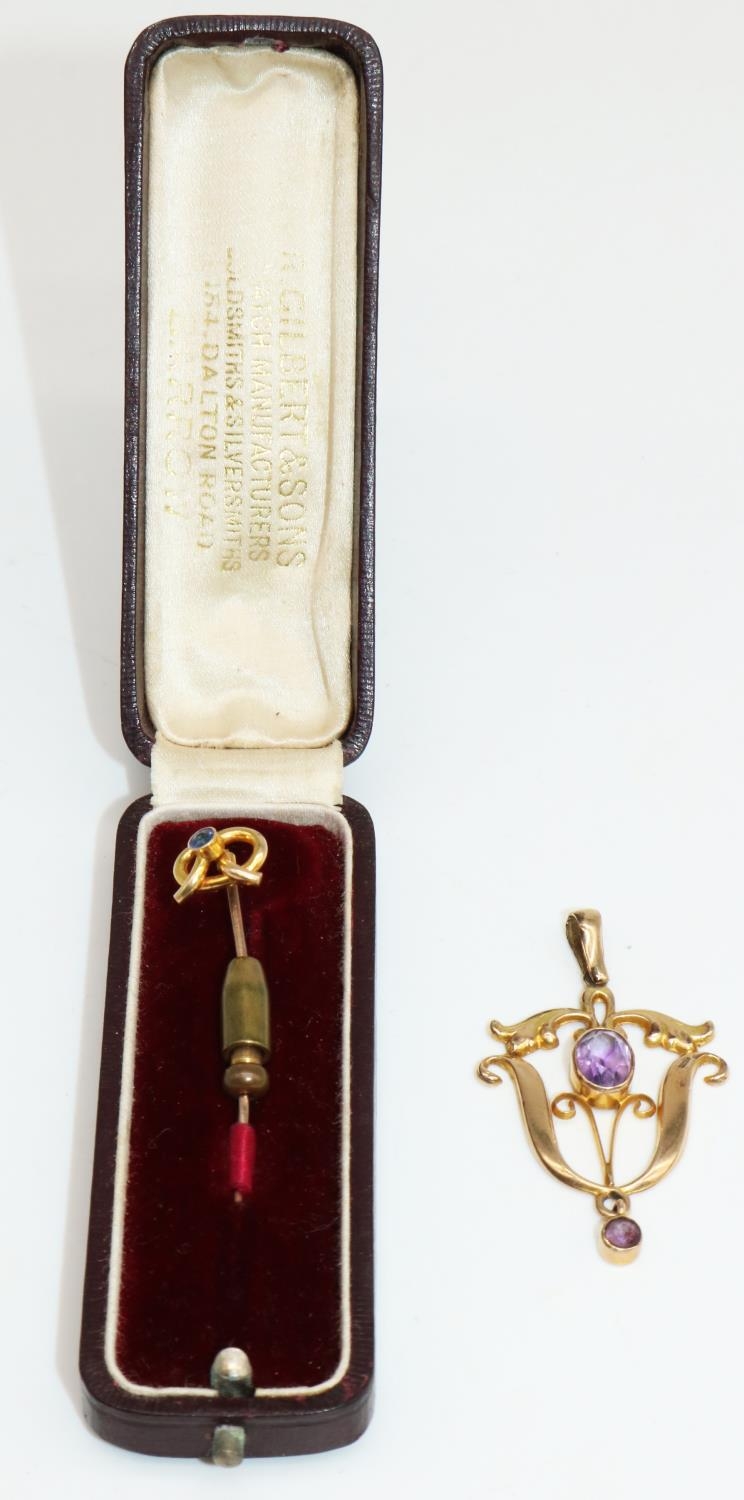 9ct yellow gold drop pendant set with amethyst, stamped 375, 2.5g, and a metal pin with 15ct