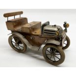 C20th wood and metal novelty table cigarette box in the form of an open top Vintage car with rear