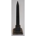 A slate model of Cleopatra's Needle, 2 piece with worn relief. Height approx 48.5cm