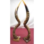 Pair of natural kudu horns with pierced decoration of elephants H84.5cm