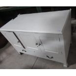 Painted white side cabinet, 3 doors above long drawer, width 112cm, depth 60cm, height 77.5cm