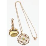 9ct yellow gold pendant set with peridot, pink stones and seed pearls, stamped 9ct, on a yellow