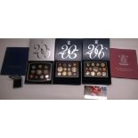 Royal Mint proof coin collections: 2000, 2005, 2006, in original boxes and packaging, and two