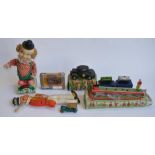 A vintage Tri-ang boxed M101 armoured car, 2 boxed Hornby Dublo OO gauge petrol wagons, a battery