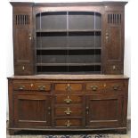 Geo.111 oak dresser, three shelf back with moulded cornice and two doors, base with six drawers