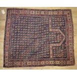 C20th Dagestan style prayer rug, with central blue ground repeating pattern geometric motifs, with