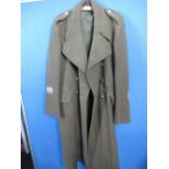 Military great coat 1951 pattern, dated 1952 with Staybrite buttons and warrant officers sleeve