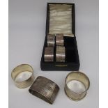 Four Geo.V hallmarked sterling silver napkin rings engraved with initial R, by John Rose,