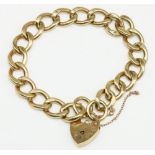 9ct yellow gold curb link bracelet with heart padlock clasp, stamped 375, L20cm, 36.8g