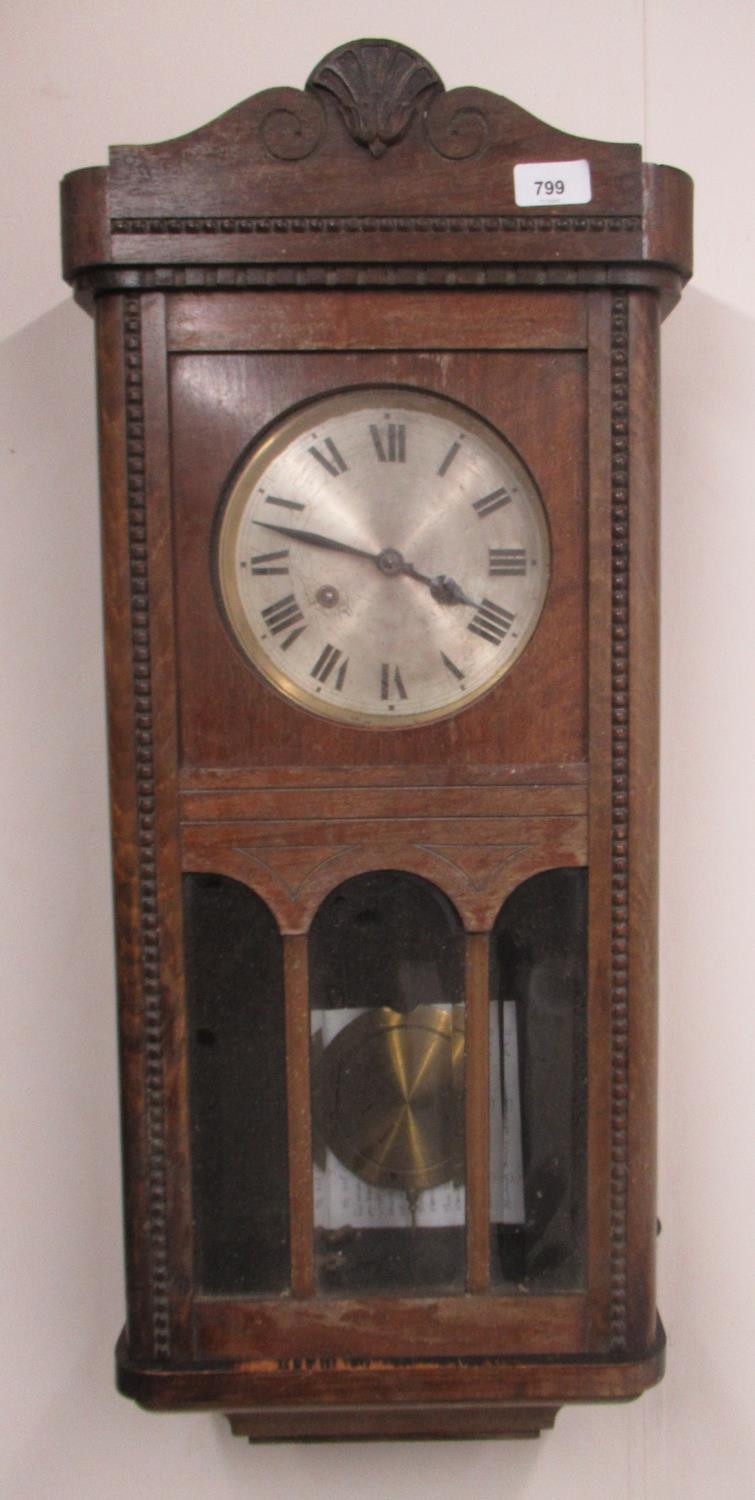 1930s H.A.C. oak cased wall clock, half glazed panel door enclosing brass bezel and silvered dial, 2