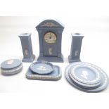 Wedgwood blue Jasperware including Millennium clock and candlesticks, trinket dishes etc.