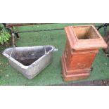 Terracotta chimney pot approx 71cm x 35cm, galvanised cow feeder/trough 73cm x 45cm (2)