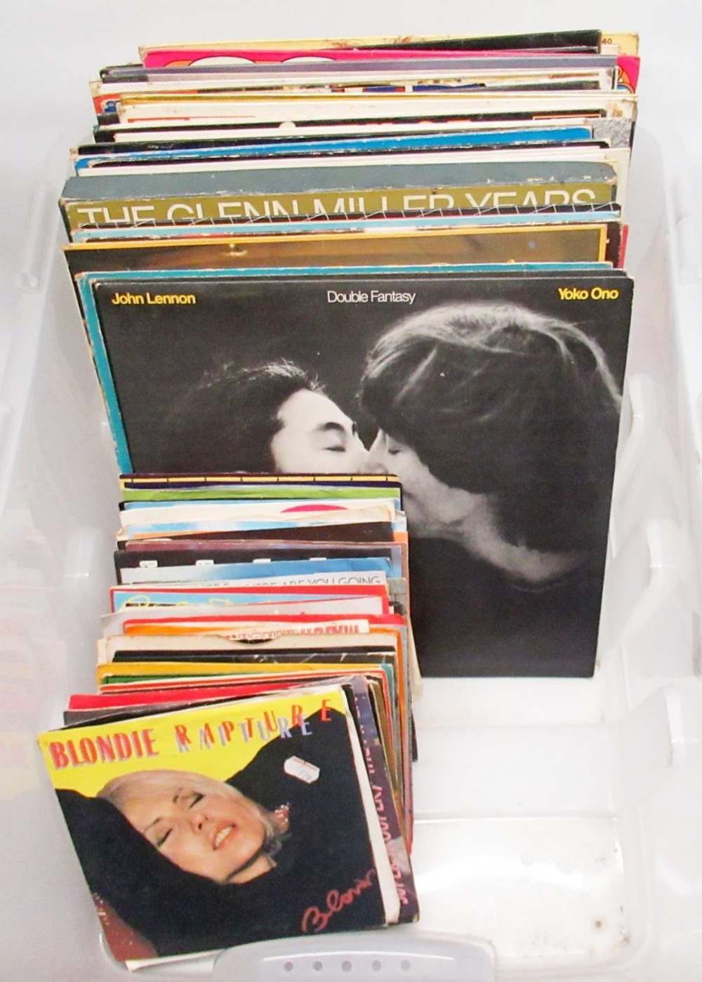 Quantity of vintage LP and 7" vinyl records including The Beatles, John Lennon, Abba, Blondie etc.