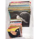 Quantity of vintage LP and 7" vinyl records including The Beatles, John Lennon, Abba, Blondie etc.