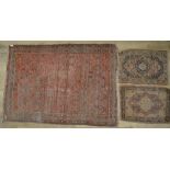 C20th Tabriz style wool rug, red ground with geometric pattern centre and border, 130cm x 190cm,