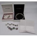 Pandora charm bracelet with safety chain, a matching necklace, both stamped ALE 925, and a