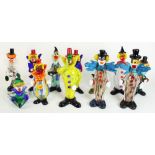 Collection of eleven Murano style glass clown figures and a clown ashtray, H32cm