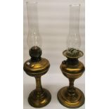 C20th brass bodied oil lamp with reeded column on circular stepped foot, overall H58cm, similar