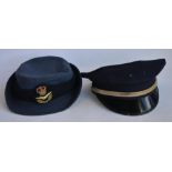 An RAF female officers cap (no size/markings) and a US Police cap by Tabuchi's of Stockton