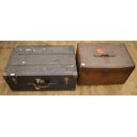 Wooden travelling trunk with metal strapping and leather handles with interior compartments, 76cm