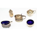 Geo.V hallmarked Sterling silver three piece cruet set with floral border and engraved initial B,