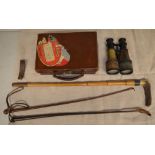 Early C20th Galilean brass bodied binoculars (A/F), two leather crops, huntsman crop with horn