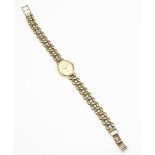 Ladies Accurist 9ct gold cased quartz wristwatch, champagne coloured dial with applied baton hour