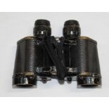 Pair of Taylor and Hudson British military binoculars, marked with broad arrow.