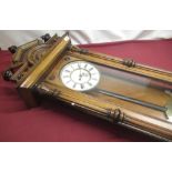 Late C19th mahogany ebonised cased double weight Vienna wall clock, full length glazed panel door,
