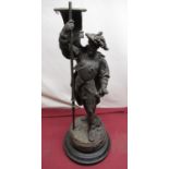 Patinated spelter model of a Soldier, titled F Cortez, on turned wooden base, H62cm