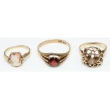 9ct yellow gold cameo ring, size K1/2, a 9ct yellow gold ring set with red stone, and a 9ct yellow