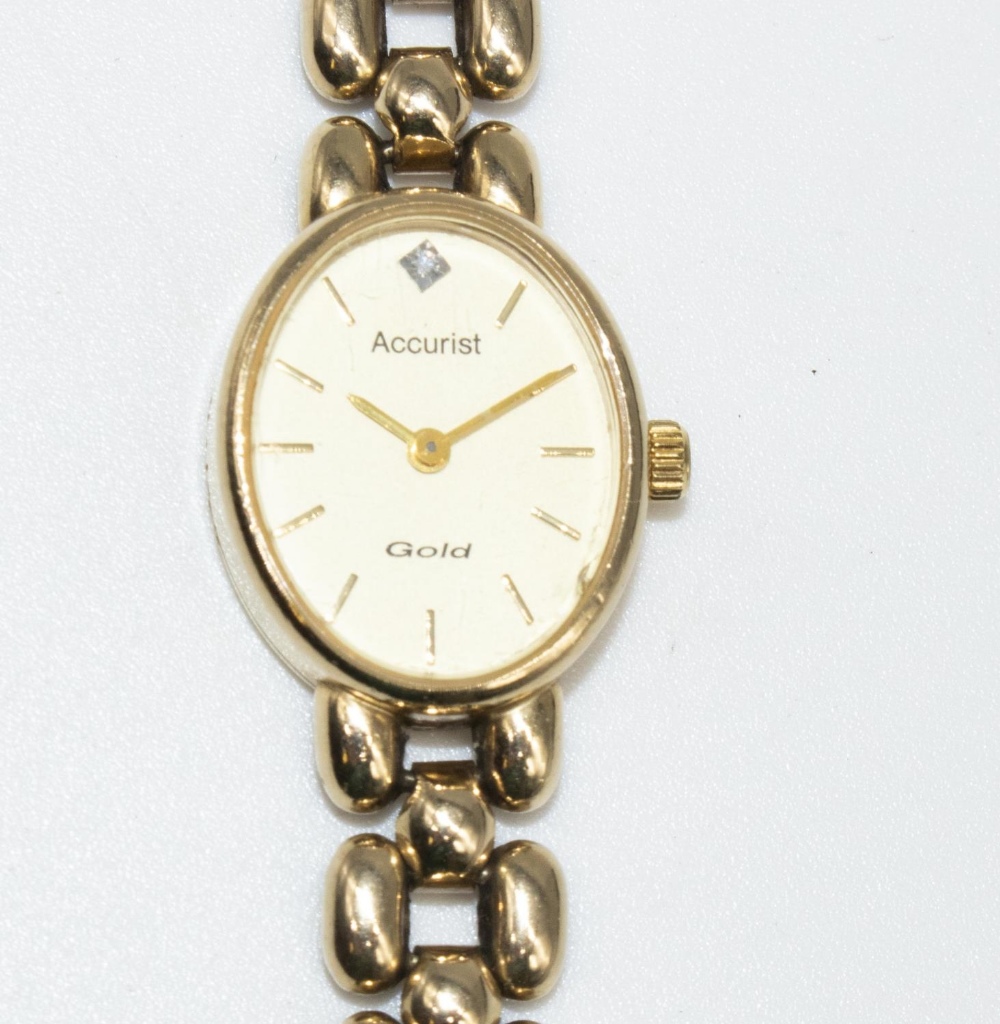 Ladies Accurist 9ct gold cased quartz wristwatch, champagne coloured dial with applied baton hour - Image 2 of 2