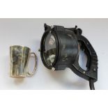 A military hand held signal lamp and a silver plated tankard hms bherlinda v day 1945