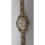 Ladies Avia 9ct gold cased hand wound wristwatch, two-piece case on matching gate style bracelet,
