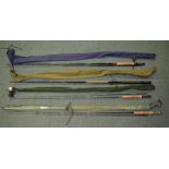 4 fly fishing rods and a collection of fly-tying accessories including 3 table mounting fly tying