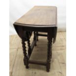 c20th oak drop-leaf gateleg dining table, on barley twist columns, width(open) approx.120cm, width(