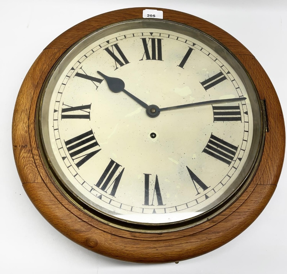 Early C20th dial clock, golden oak case with brass bezel enclosing painted metal Roman dial, with