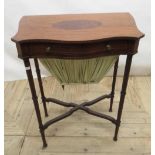 c20th mahogany sewing table with inlaid serpentine top, single frieze drawer and pull-out bag, on