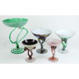 Five art glass pedestal bowls on twisted stems, largest H27cm