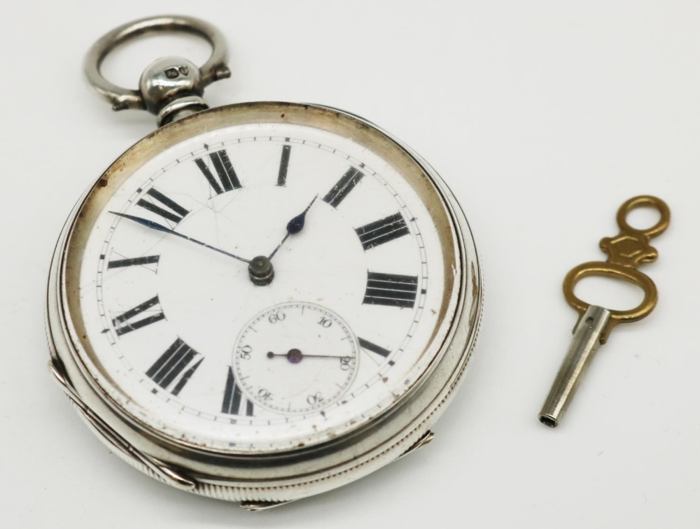 Swiss late Victorian silver open faced and key wound set pocket watch, white enamel dial,