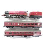 00-gauge Queen Elizabeth 6201 engine with LMS coal tender in burgundy livery and 2 Harry Potter