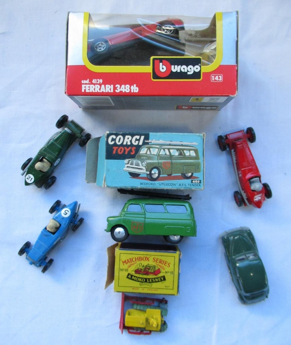 Collection of diec cast vehicles includes Burago Ferrari, matchbox series bulldozer, Corgi 405