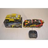 2 electric powered radio control cars, one 4WD with added Carson Motorsport Mampe bodyshell (damaged