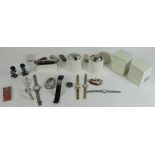 Collection of wristwatches, pen knives, lighters and Golly figures to include two Radleys of
