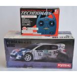 Boxed Kyosho 1/10 Peugeot 206 WRC radio control 4WD rally car. Chassis built but not run,