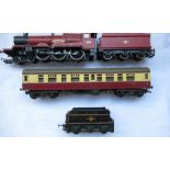 00 gauge Hogwarts Castle engine 5972 with tender, luxury passenger carriage and a black livery